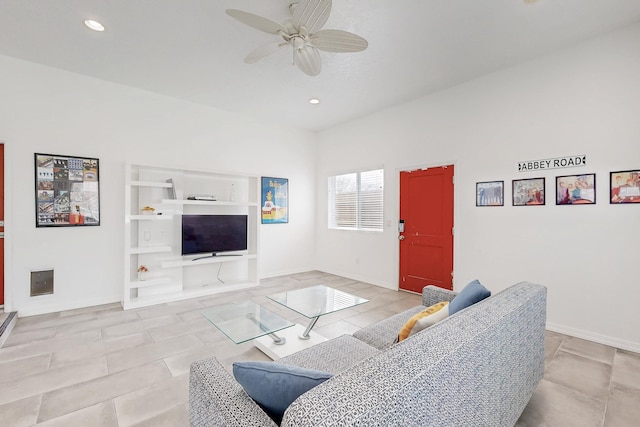 living area featuring light tile patterned flooring, recessed lighting, a ceiling fan, and baseboards