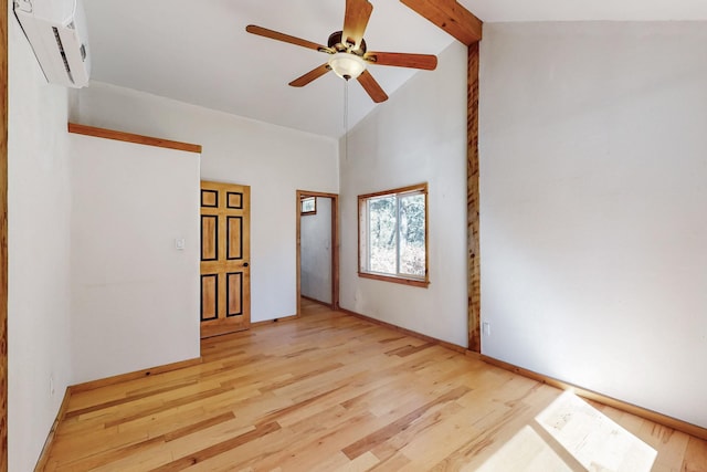 spare room with light wood finished floors, ceiling fan, beamed ceiling, high vaulted ceiling, and a wall mounted AC