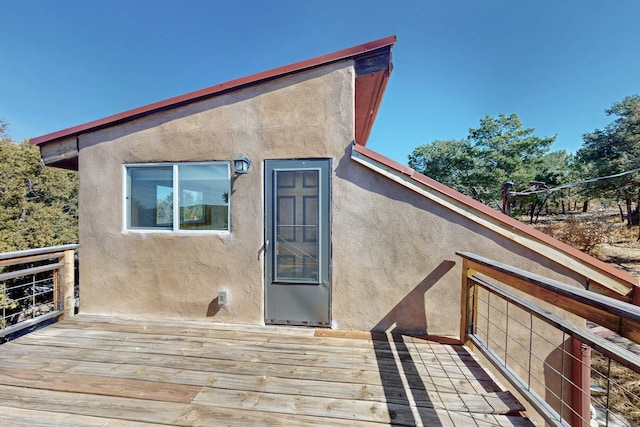 exterior space featuring stucco siding