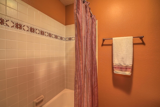 full bath featuring shower / bathtub combination with curtain