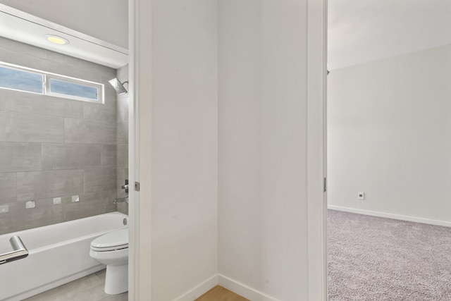 full bath featuring  shower combination, baseboards, and toilet