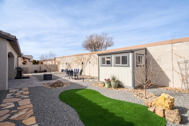 view of yard with a patio area and a fenced backyard