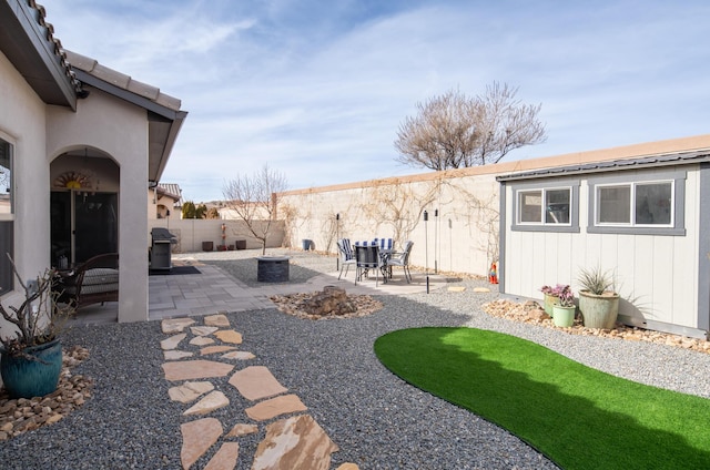 view of yard with a patio area and a fenced backyard