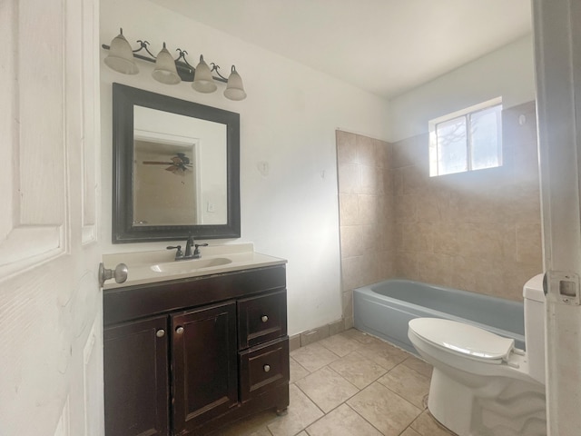 full bath with toilet, tub / shower combination, vanity, baseboards, and tile patterned floors