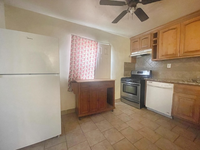 kitchen featuring white appliances, light countertops, under cabinet range hood, open shelves, and backsplash