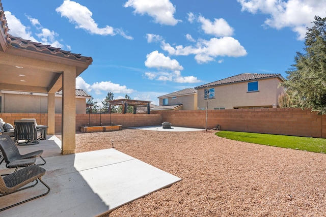 view of yard featuring a fenced backyard and a patio