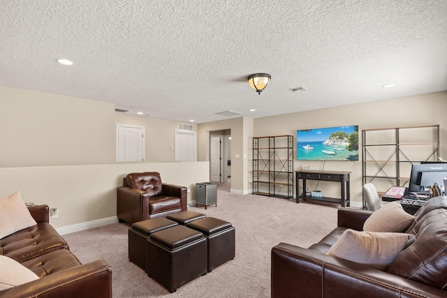 living area with carpet floors, visible vents, and baseboards