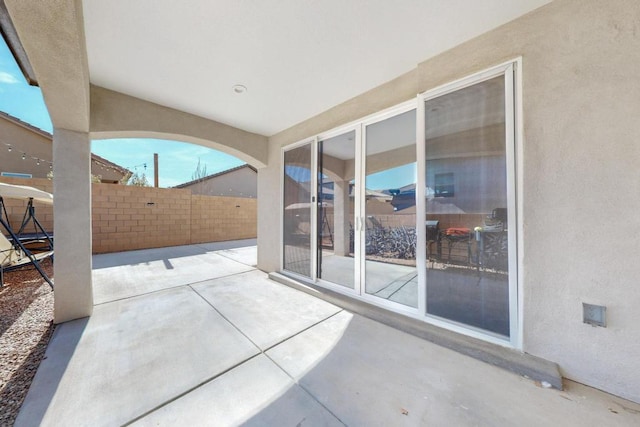 view of patio / terrace with fence