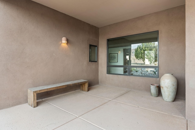 exterior space with stucco siding