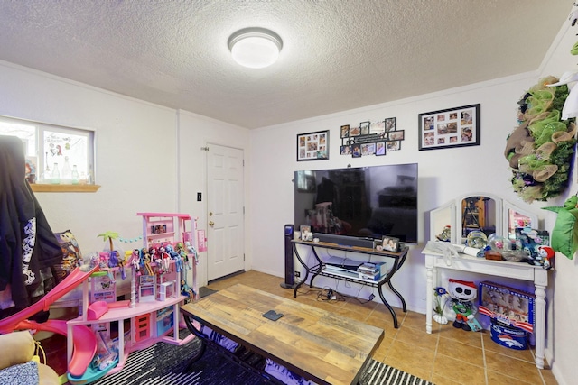 503 US Rt 66, Moriarty, NM 87035 - playroom featuring a textured ceiling and tile patterned flooring