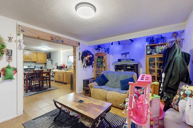 503 US Rt 66, Moriarty, NM 87035 - living room featuring light tile patterned floors and a textured ceiling