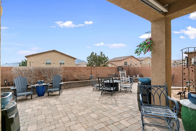 view of patio / terrace featuring a fenced backyard and outdoor dining area