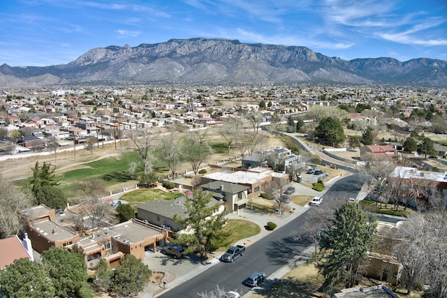 birds eye view of property featuring a residential view and a mountain view