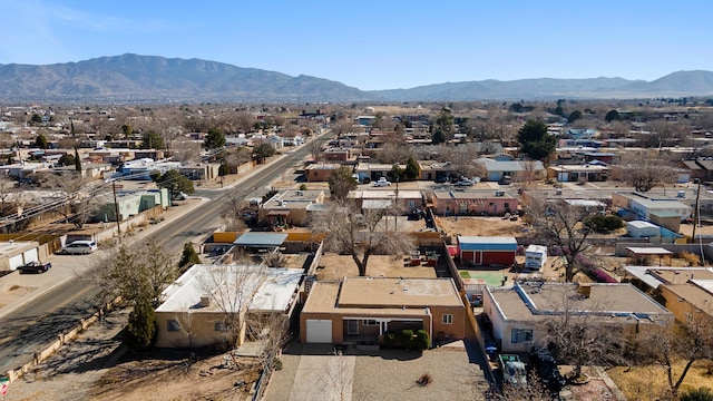 bird's eye view with a residential view and a mountain view