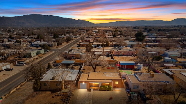 birds eye view of property featuring a mountain view