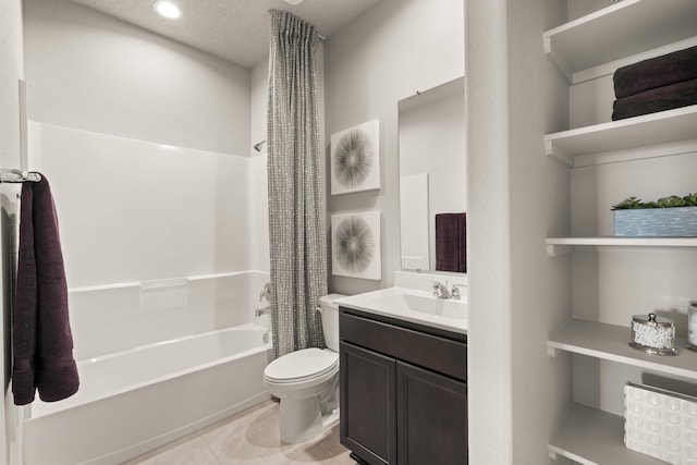 full bathroom with toilet, tile patterned flooring, shower / bathtub combination with curtain, a textured ceiling, and vanity