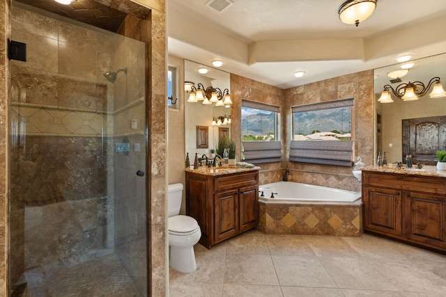 full bath with two vanities, visible vents, a garden tub, and a shower stall