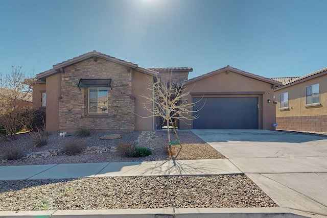 view of front of home featuring an attached garage, stucco siding, concrete driveway, stone siding, and a tiled roof