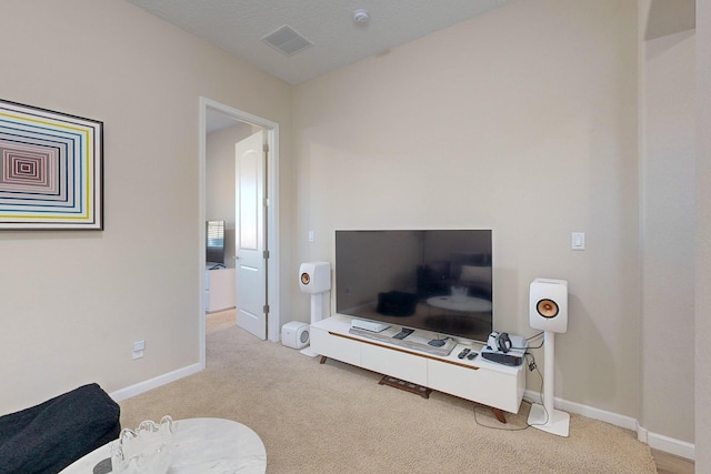 9020 Retablo Rd NW, Albuquerque, NM 87120 - living area with carpet floors, baseboards, and visible vents