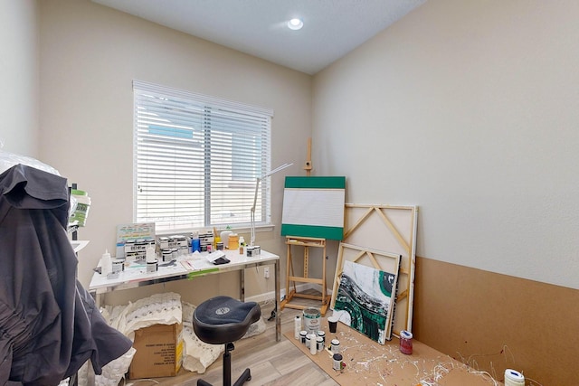 office space featuring recessed lighting, baseboards, and wood finished floors