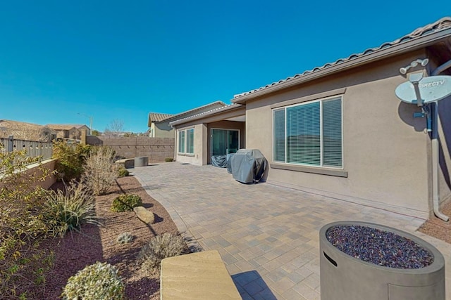 view of patio / terrace featuring a grill and a fenced backyard