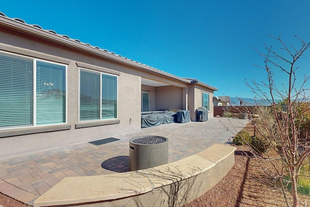 view of patio / terrace featuring fence