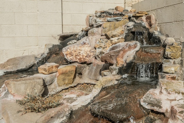 interior details featuring concrete block wall