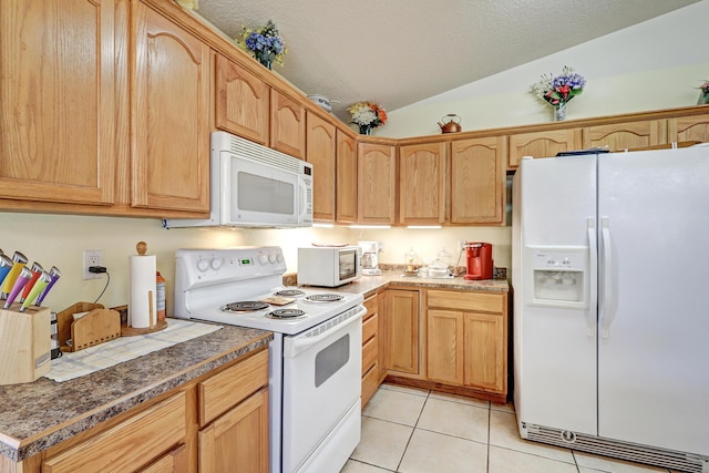 kitchen with light tile patterned floors, a textured ceiling, lofted ceiling, a toaster, and white appliances