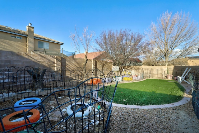 view of yard featuring a fenced backyard