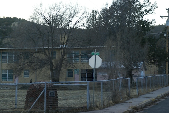 view of home's exterior with a fenced front yard