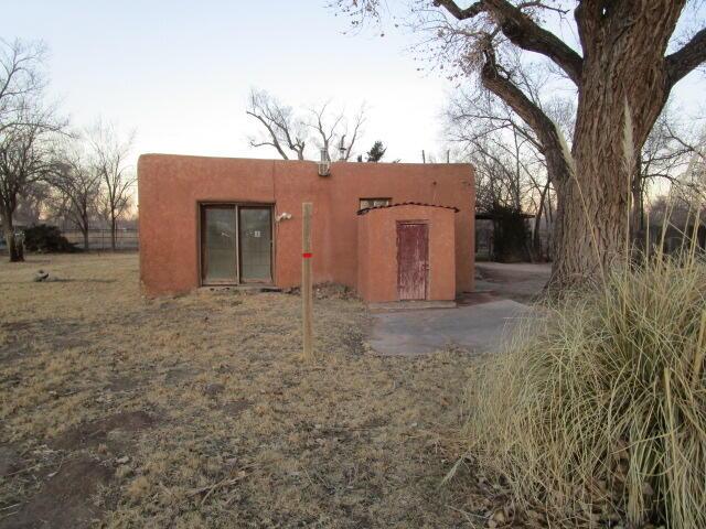 view of outdoor structure at dusk