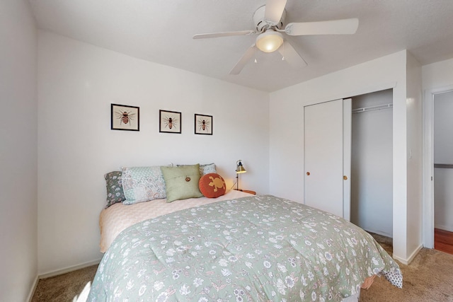 bedroom featuring a closet, baseboards, a ceiling fan, and carpet flooring