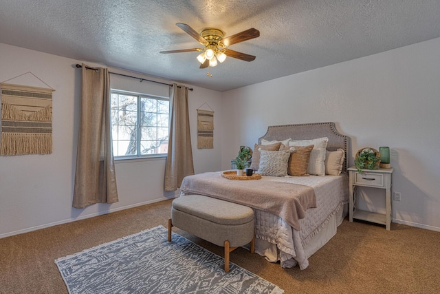 carpeted bedroom featuring ceiling fan, baseboards, and a textured ceiling