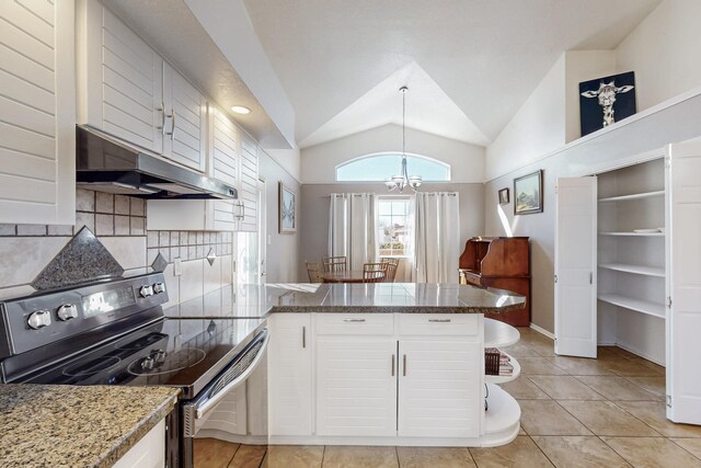 kitchen with white cabinets, vaulted ceiling, a peninsula, range with electric cooktop, and under cabinet range hood