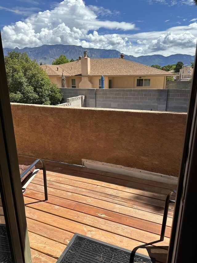 balcony featuring a mountain view