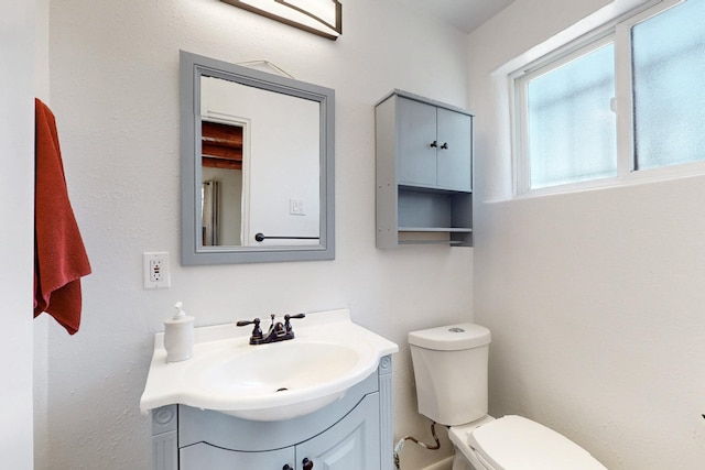 half bath with toilet and vanity