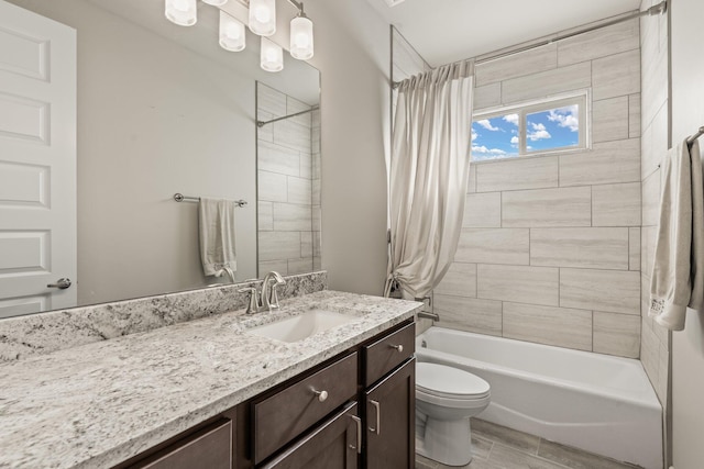 full bathroom featuring shower / tub combo, vanity, toilet, and wood finished floors