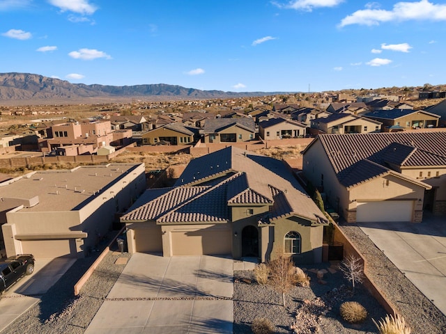 birds eye view of property featuring a residential view and a mountain view