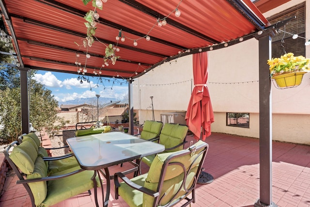 view of patio featuring outdoor dining area