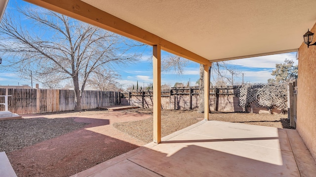 view of patio with a fenced backyard