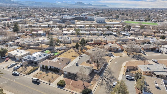 birds eye view of property featuring a residential view and a mountain view