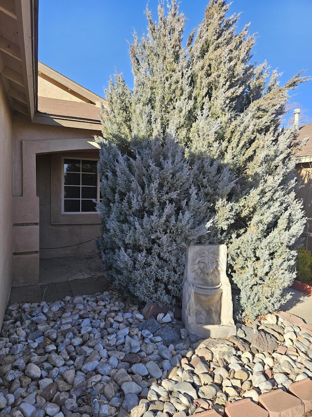 exterior space with stucco siding