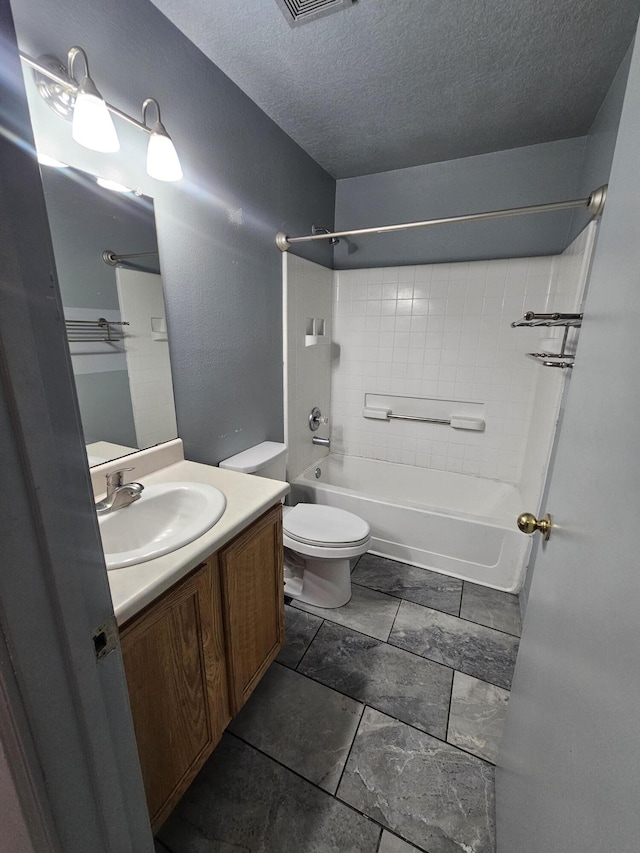 full bathroom featuring a textured ceiling, toilet, visible vents, vanity, and shower / washtub combination