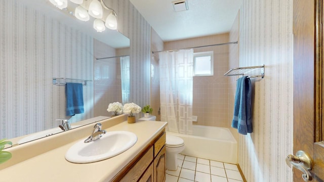 full bathroom with visible vents, wallpapered walls, toilet, vanity, and tile patterned floors