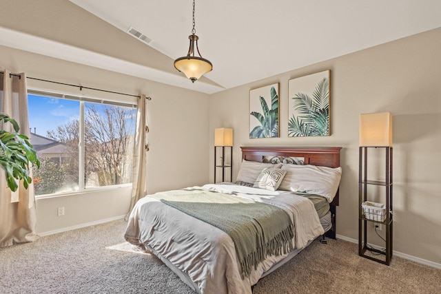 carpeted bedroom with vaulted ceiling, visible vents, and baseboards