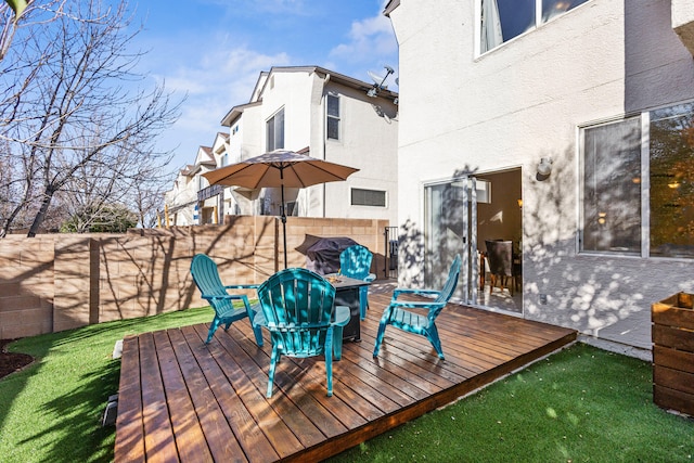 wooden deck featuring fence