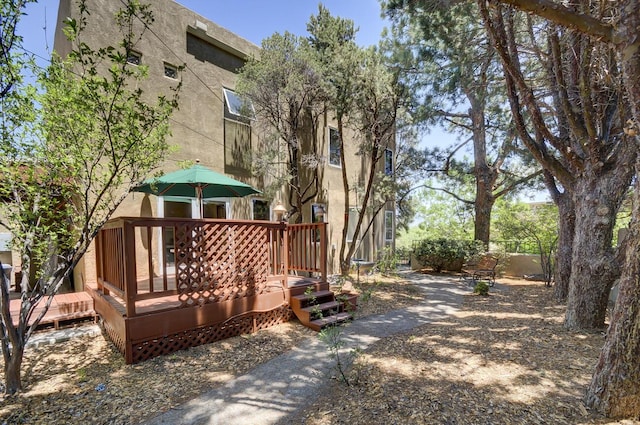 view of yard with a wooden deck