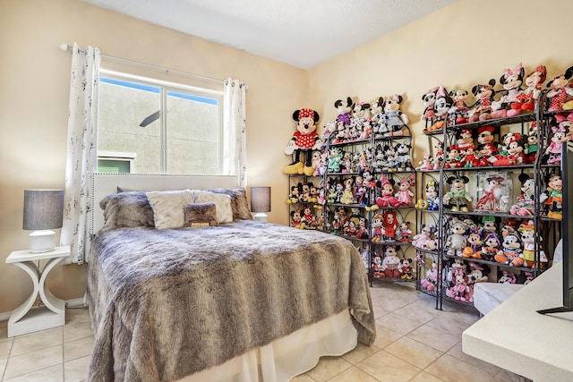 9316 Iron Creek Ln NW, Albuquerque, NM 87120 - tiled bedroom with baseboards