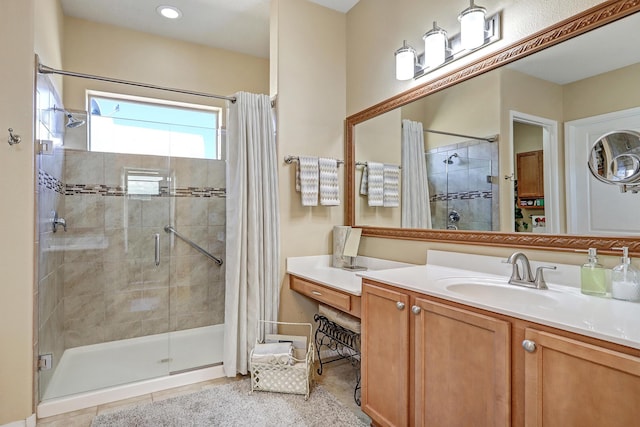 9316 Iron Creek Ln NW, Albuquerque, NM 87120 - full bathroom featuring a shower stall, vanity, tile patterned floors, and recessed lighting