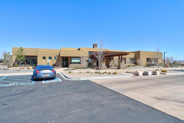 9316 Iron Creek Ln NW, Albuquerque, NM 87120 - view of property with uncovered parking